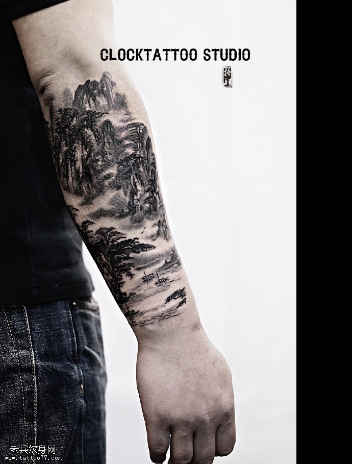 手臂的桂林山水纹身图案