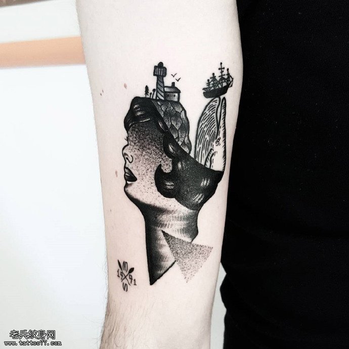 手臂黑灰抽象头像纹身图案