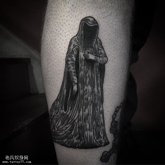 小腿的无脸鬼纹身图案