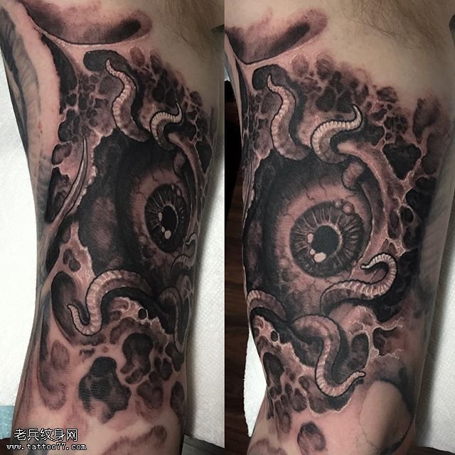 大臂虐心的眼球纹身图案