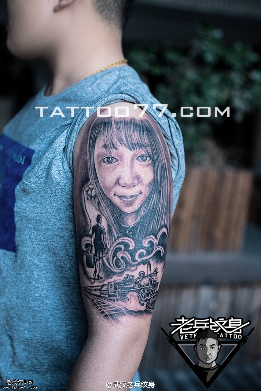 武汉纹身店打造的大臂肖像纹身图案作品