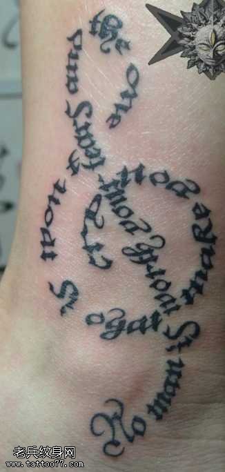 腿部外侧字母音符纹身图案