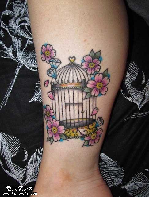 腿部好看的鸟笼花朵纹身图案