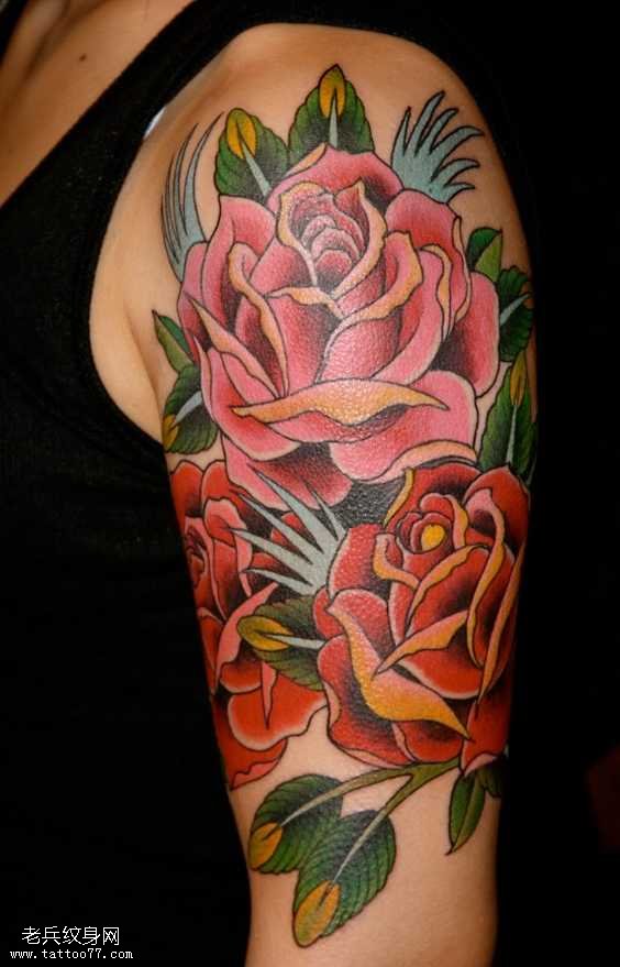 手臂漂亮一大簇鲜花纹身图案