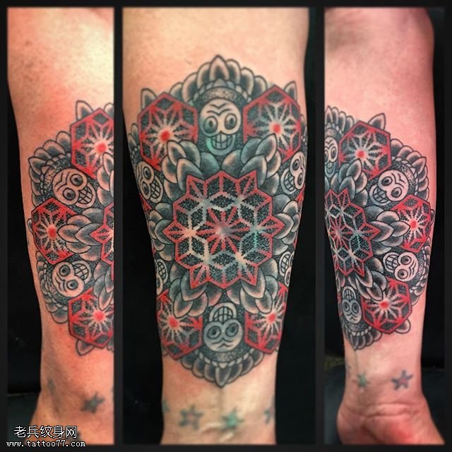 小臂上的梵花骷髅纹身图案