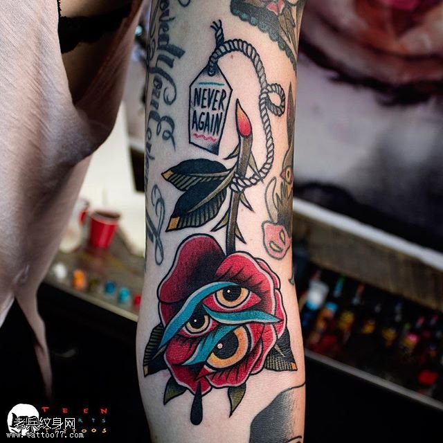 手臂三只眼玫瑰纹身图案