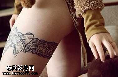 腿部蕾丝蝴蝶结纹身图案
