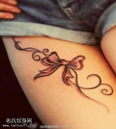 腿部漂亮的蝴蝶结纹身图案