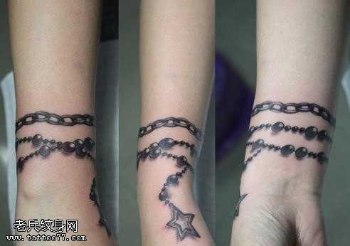 手臂链接五星纹身图案