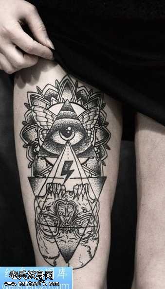 腿部点刺眼纹身图案