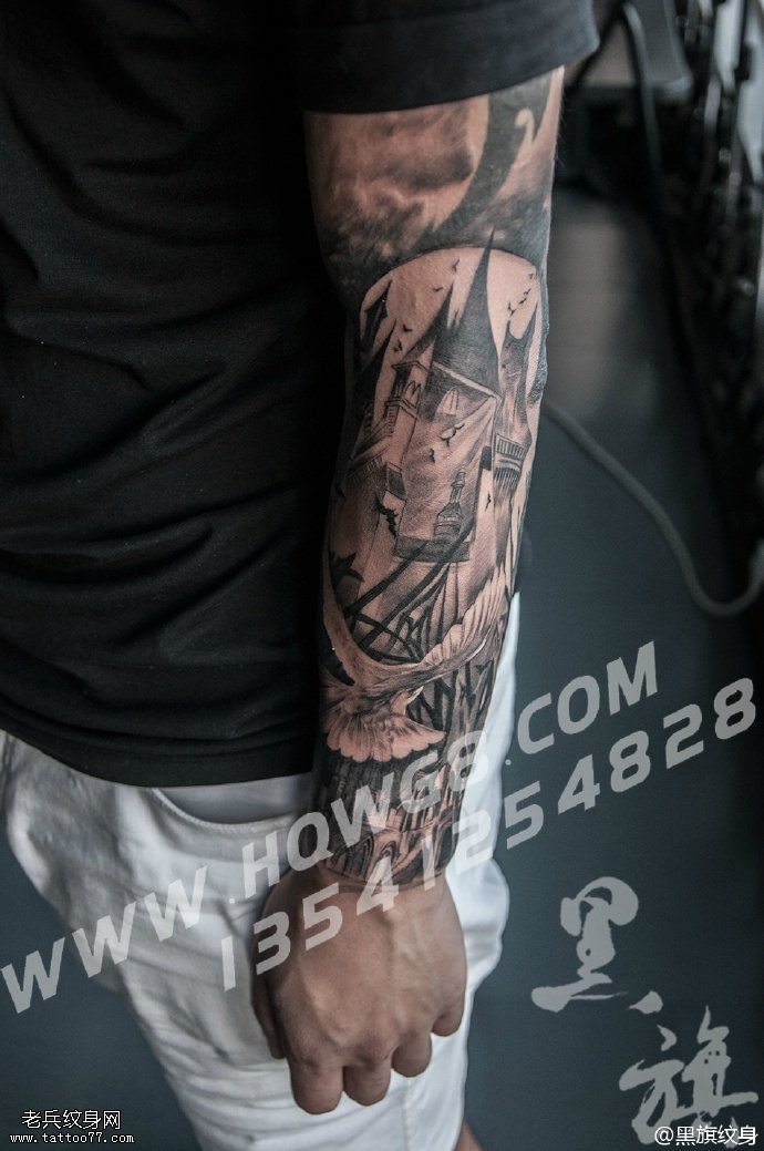 手臂上的建筑纹身图案