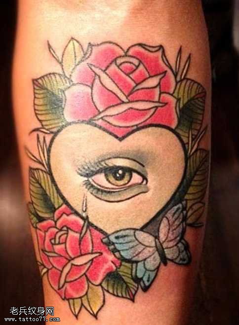 手臂爱心眼花纹身图案