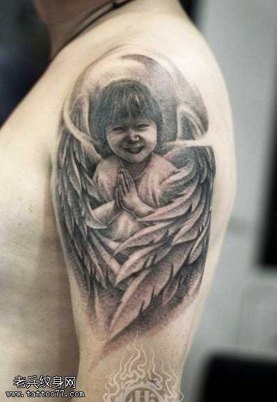 手臂漂亮的小天使纹身图案