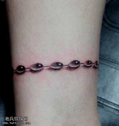 腿部潮流流行的水珠纹身图案