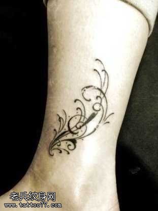 腿部图腾藤蔓纹身图案