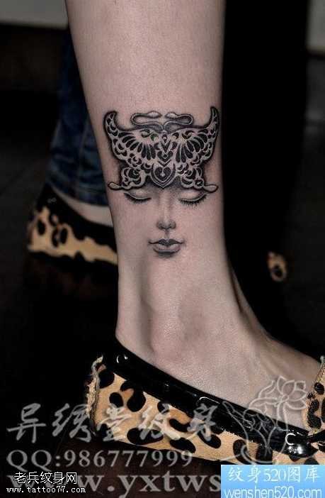 腿部蝴蝶脸纹身图案