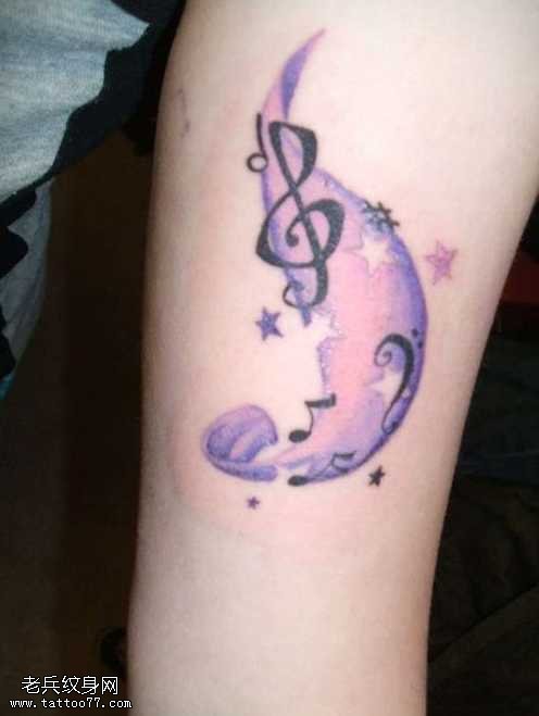 腿部彩音符纹身图案