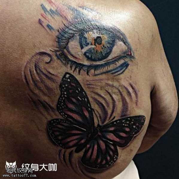 背部个性蝴蝶眼睛纹身图案