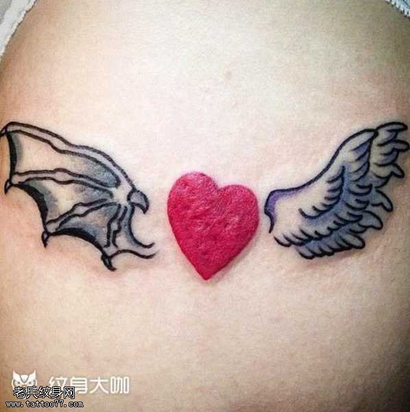 腿部心翅膀纹身图案