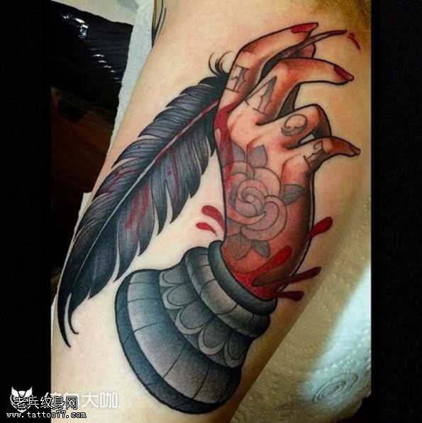 腿部手笔纹身图案