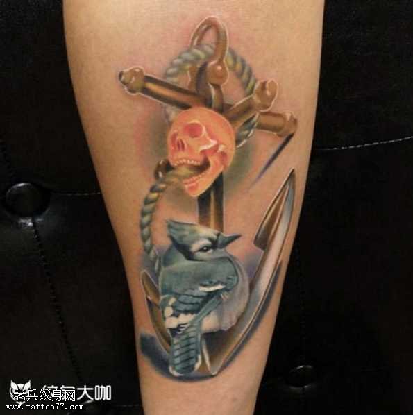 腿部十字架小骷髅纹身图案