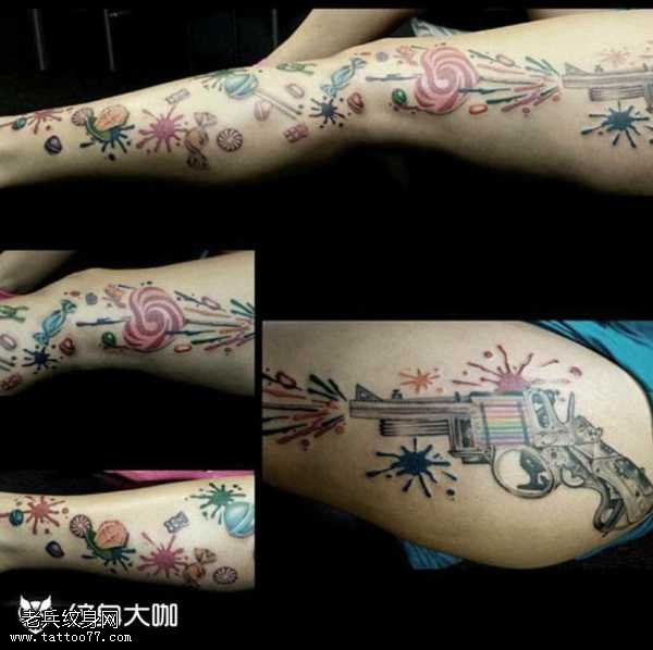 腿部手轮枪纹身图案