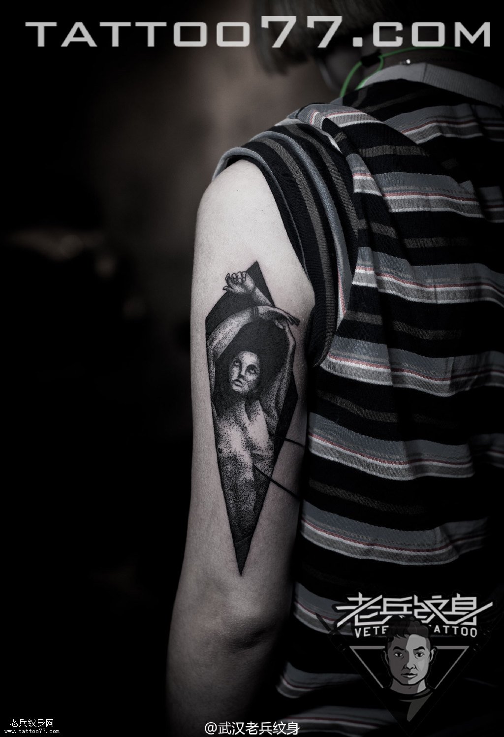 手臂后侧点刺人物纹身图案作品