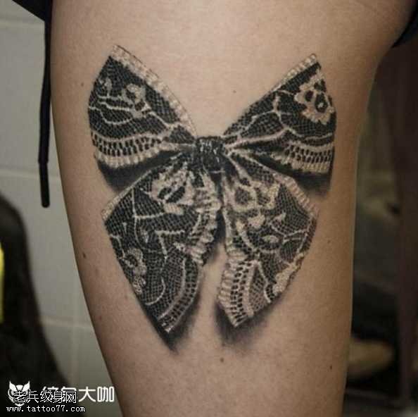 腿部黑色蝴蝶结纹身图案