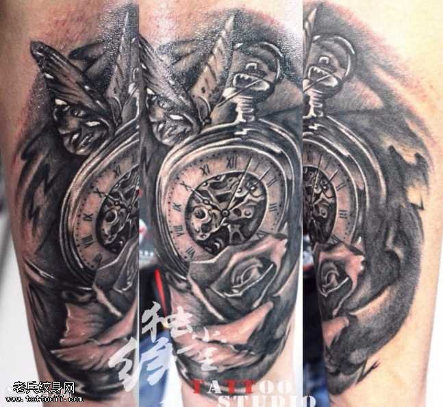 腿部闹钟纹身图案