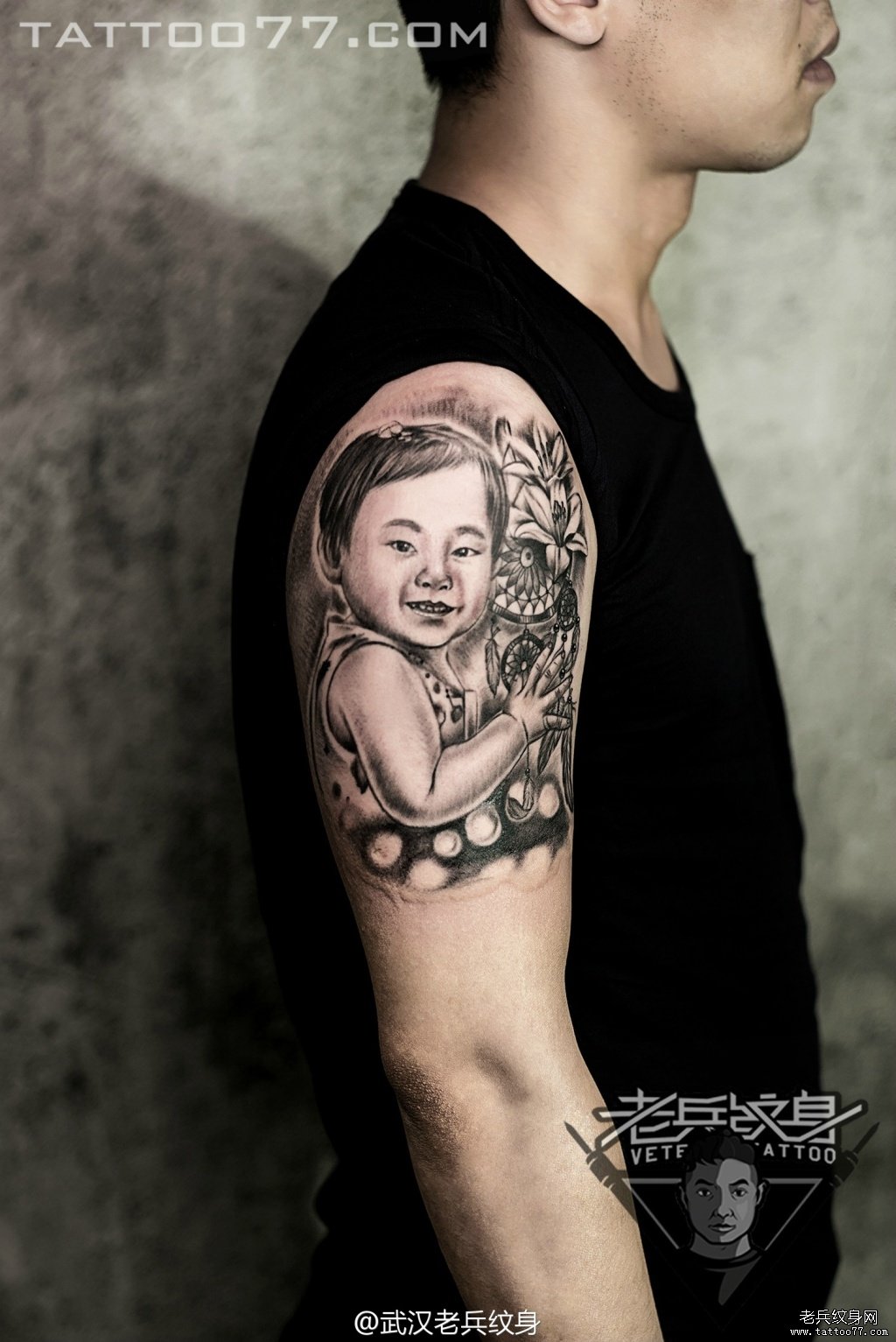 大臂宝宝肖像纹身图案作品