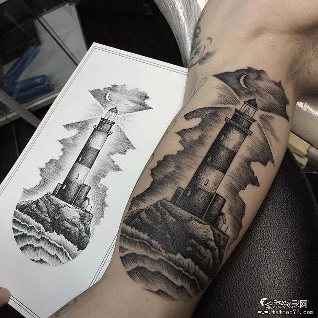 手臂灯塔风景纹身图案