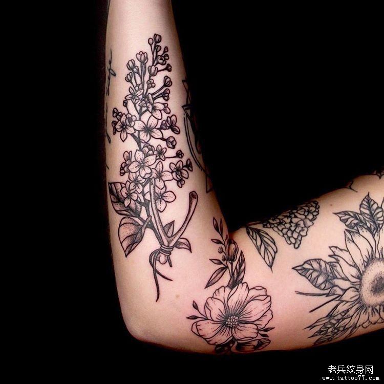 手臂个性几何点刺花纹身图案