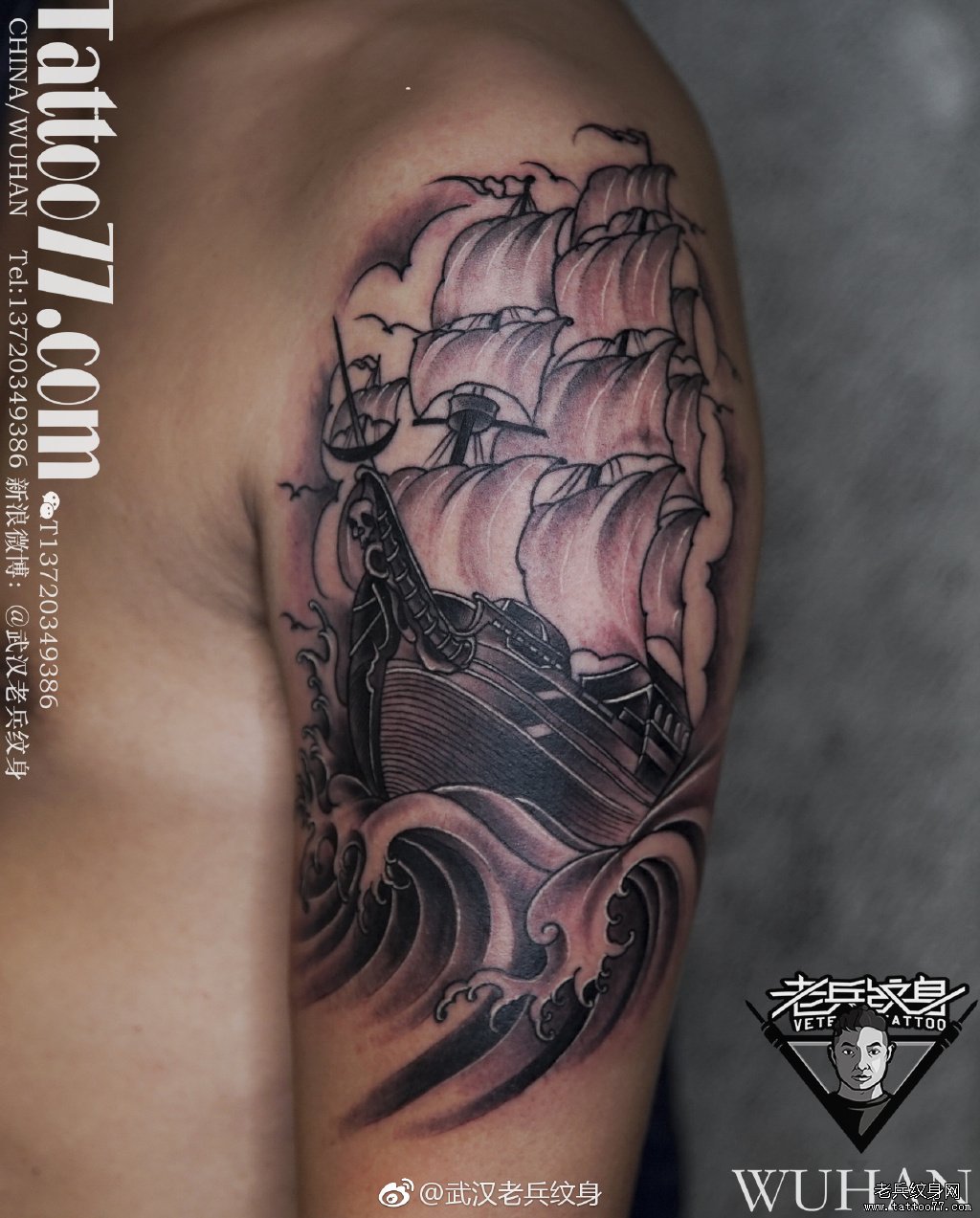 大臂黑灰写实帆船纹身图案