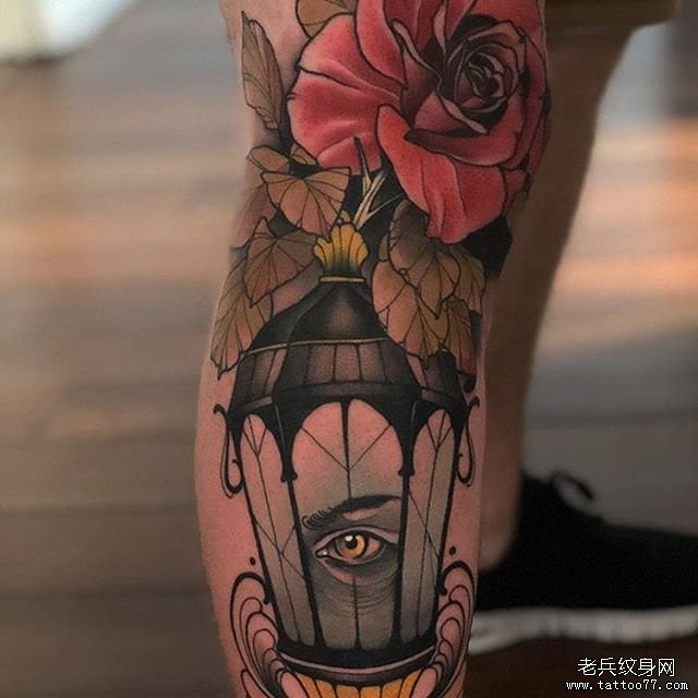 小腿玫瑰眼睛纹身图案