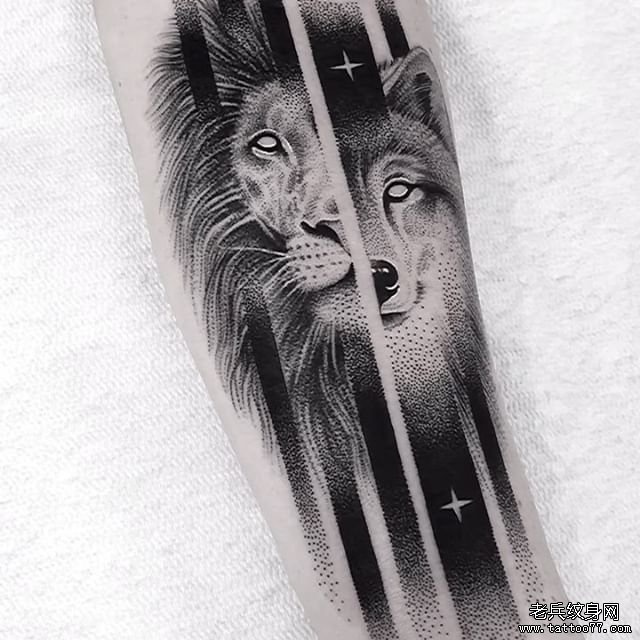 手臂点刺狮子狐狸纹身