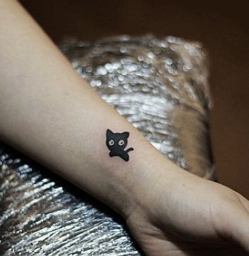 手臂纹身图案：手臂可爱图腾猫咪纹身图案纹身图片