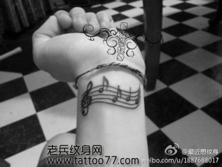 唯美时尚的手臂音符纹身图案