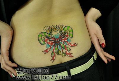 美女腰部好看时尚的蝴蝶结纹身图案