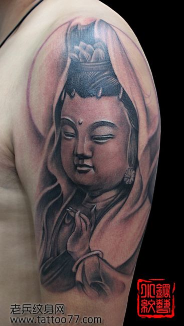 一款手臂笑脸观音纹身图案
