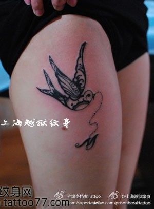 美女腿部流行的图腾燕子纹身图案